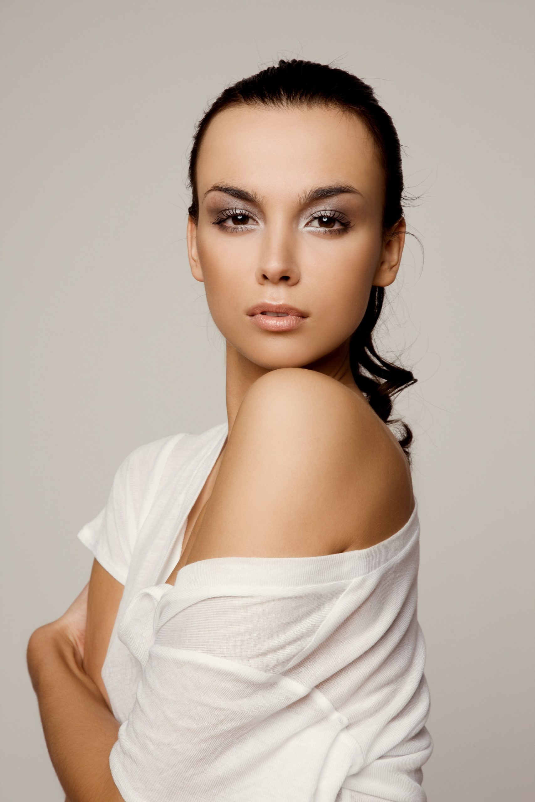 photo of woman wearing white top